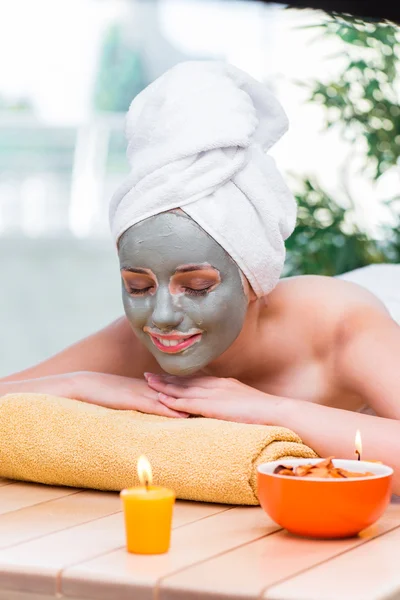 Young woman in spa health concept