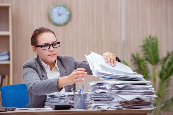 Busy stressful woman secretary under stress in the office