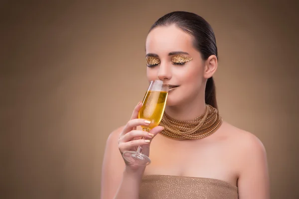 Young woman with champagne glass