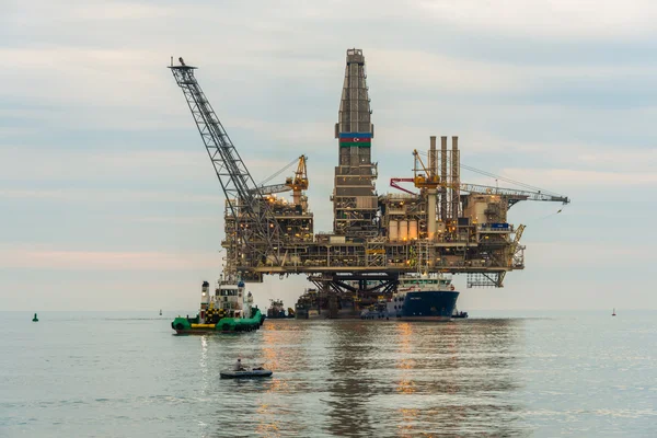 Oil rig platform in the calm sea