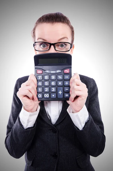 Funny accountant with calculator on white