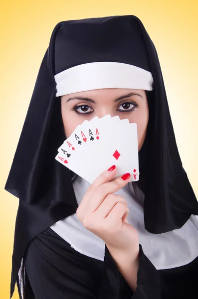 Nun playing cards