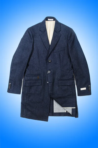 Male coat on blue