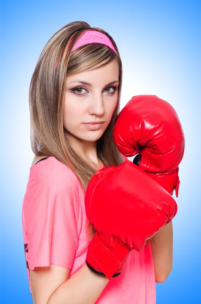 Young lady with boxing gloves