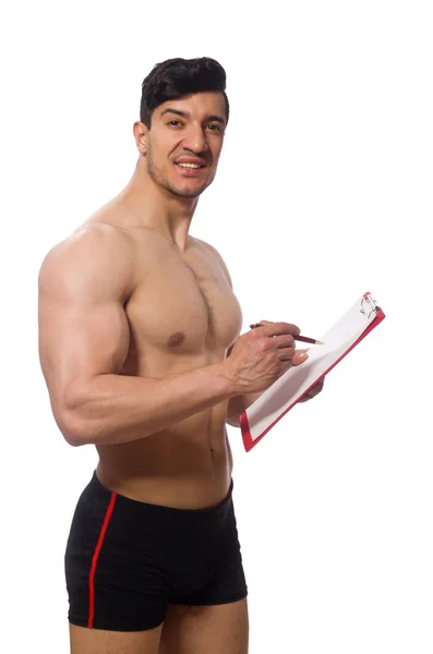Muscular man with blank pad isolated on white