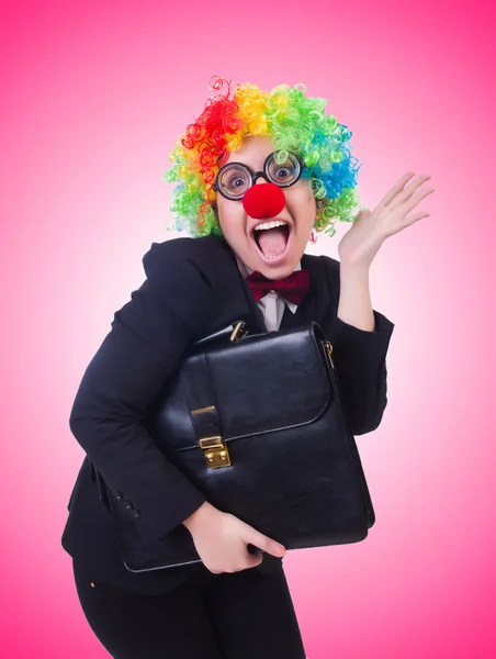 Woman clown businesswoman against the gradient