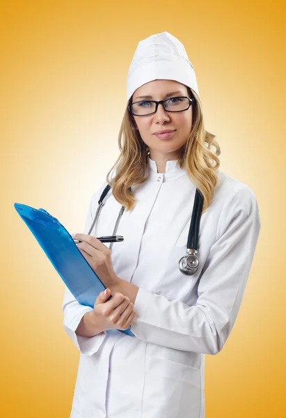 Woman doctor isolated on yellow