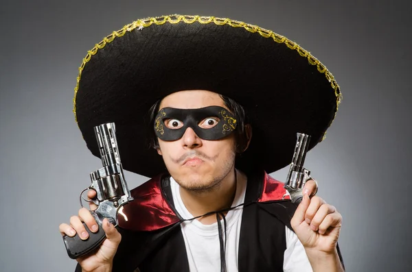 Person wearing sombrero hat in funny concept