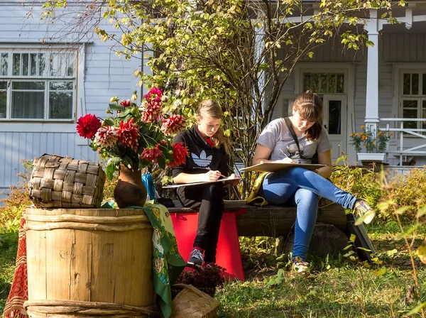 Children paint in the open air