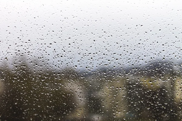 Raindrops on glass rain, sad background weather