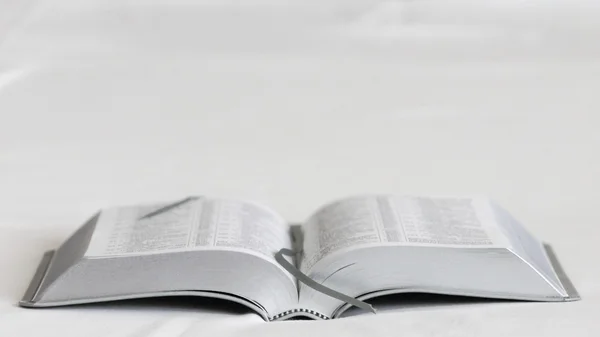 Book on a white background. Bible. Front view.