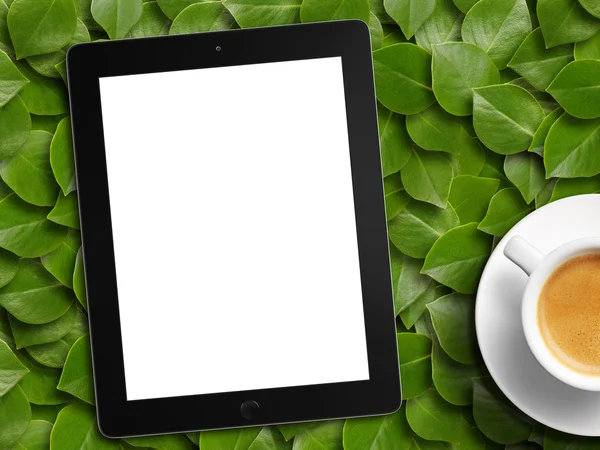 Tablet white screen and coffee