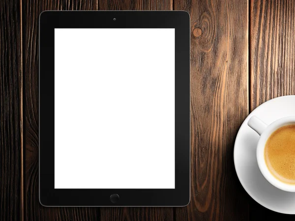 Tablet white screen and coffee