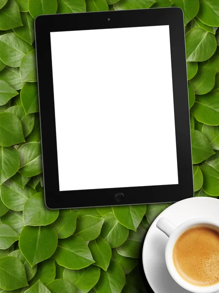 Tablet white screen and coffee