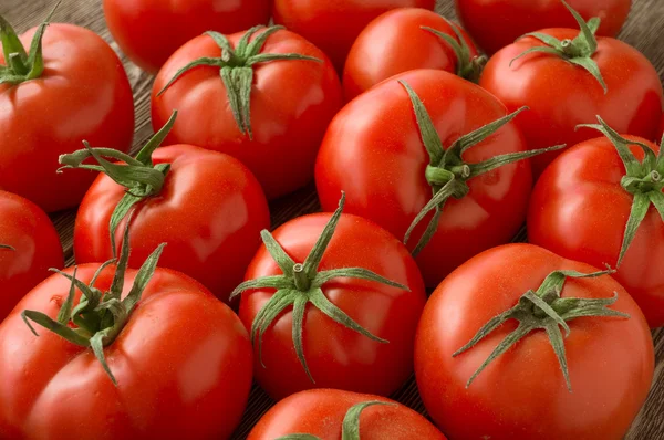 Red tomatoes background.
