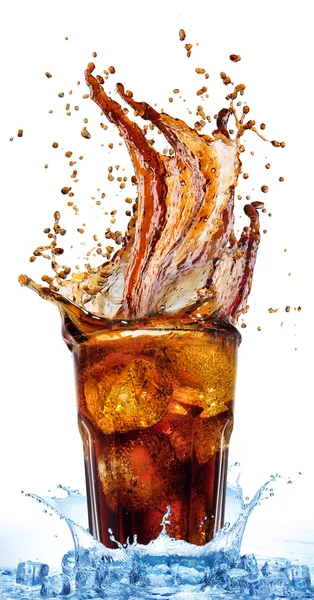 Splash from ice cubes in  glass of cola