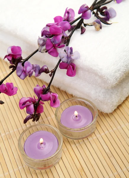 Candles, flowers and towels