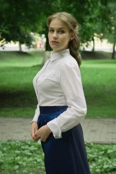 Russian woman in retro style posing on the street.