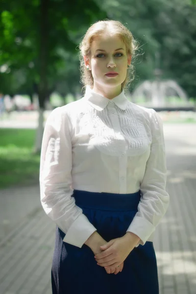 Russian woman in retro style posing on the street.