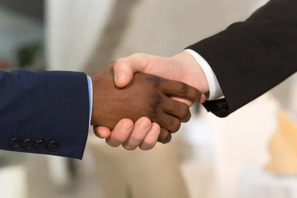 Business people shaking hands