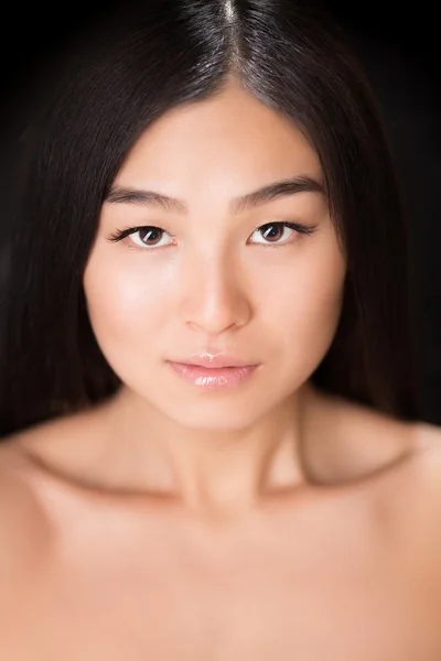 Close-up of face of Asian lady