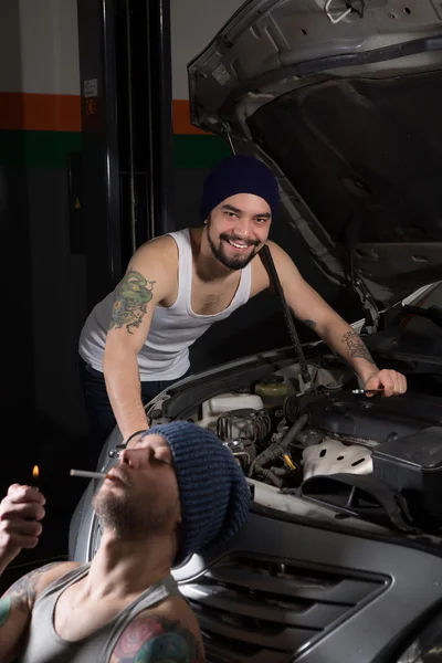 Workers at service station