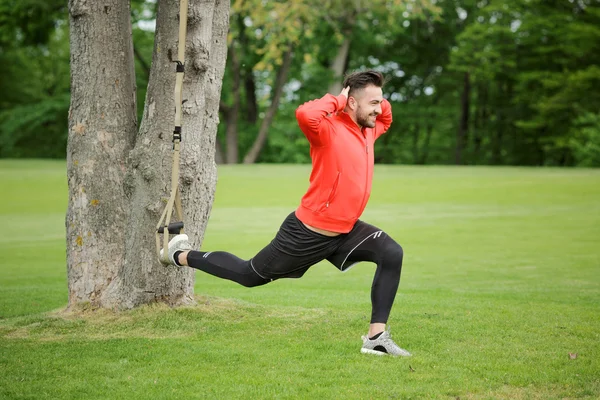 Sport man training in park