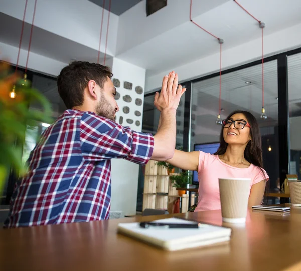 Freelance man and woman working in restaurant