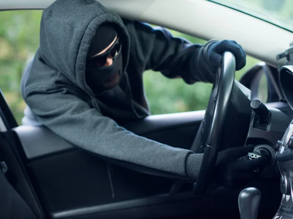 Burglar wearing mask balaclava, car burglary