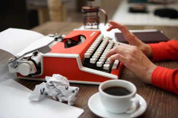 Side view of typewriter on desk