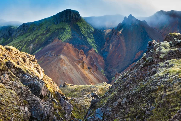 Valley surrounded by rhyolite mountains