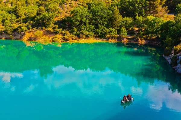 Azure water mirror reflecting clouds