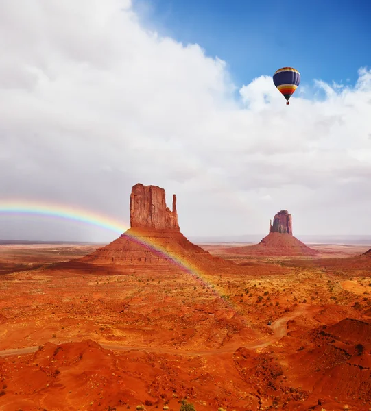 Huge rainbow and rocks - 
