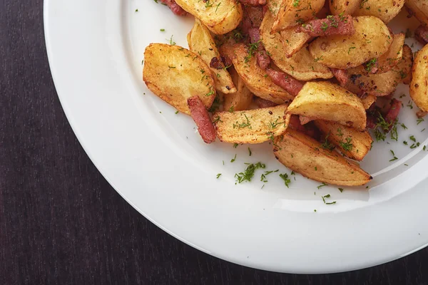 Roasted potatoes with bacon and mushrooms