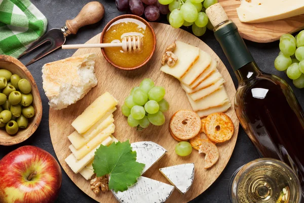 Wine, grapes, cheese and honey