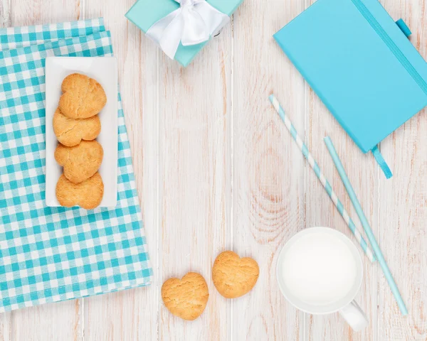 Cup of milk, heart shaped cookies