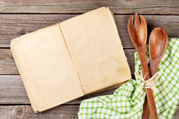 Blank vintage cooking book and utensils