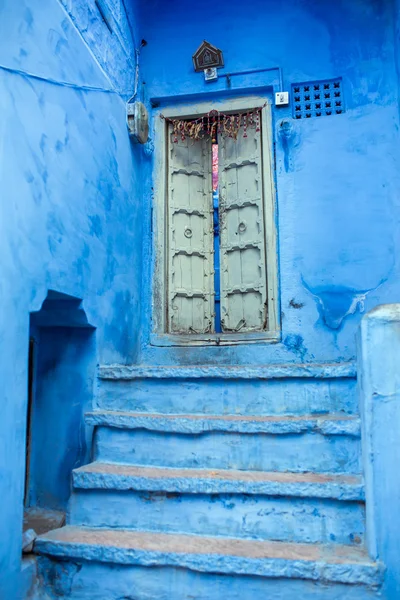 Classic door, stairs in Blue City
