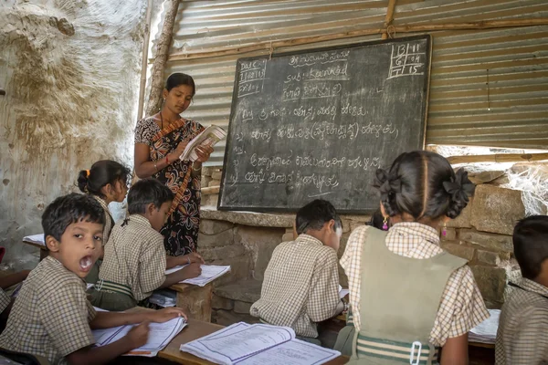 Children attending lesson in classroom