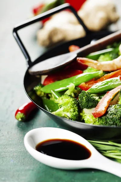 Colorful stir fry in a wok