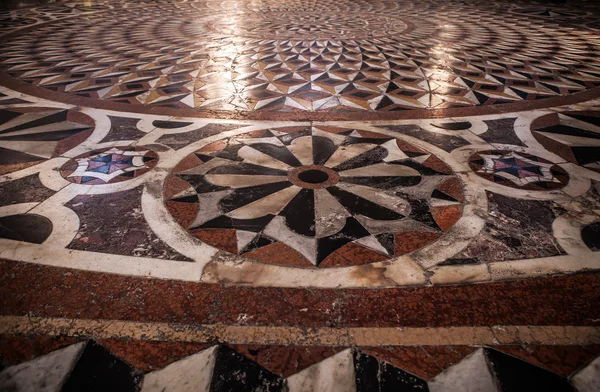 Antique tiles floor as background.