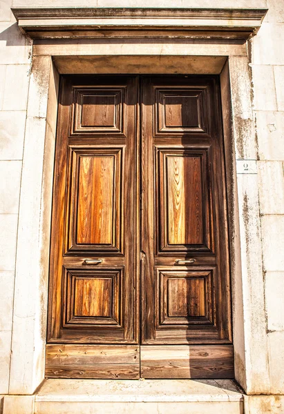 Ancient Venetian wooden door.