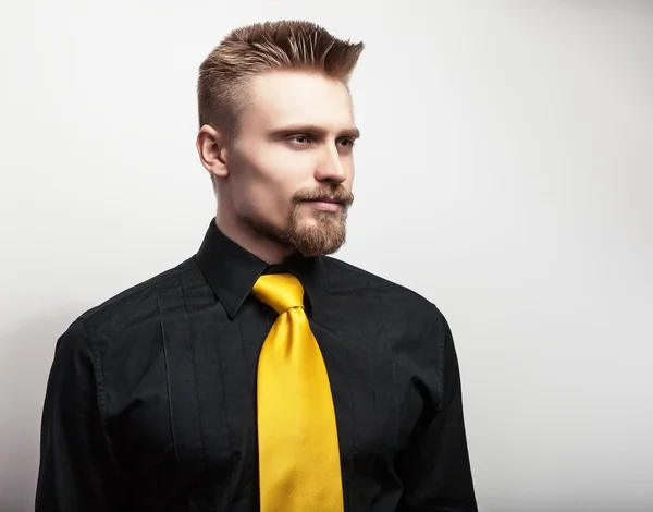 yellow shirt with tie
