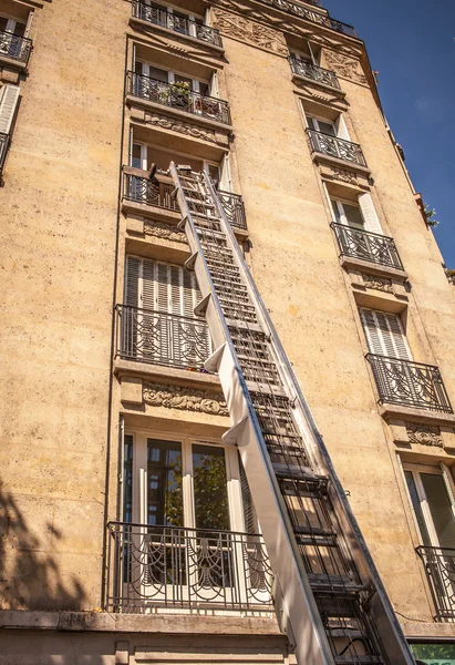 Scale up a ladder of firefighters