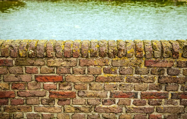 Brick protection of bridge over water