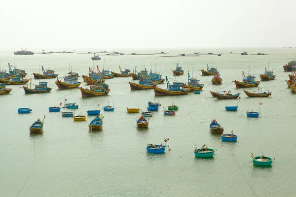 A Fisherman Boats Float in South China Sea