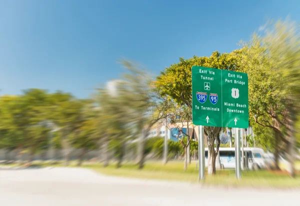 Road signs in Miami from a moving vehicle