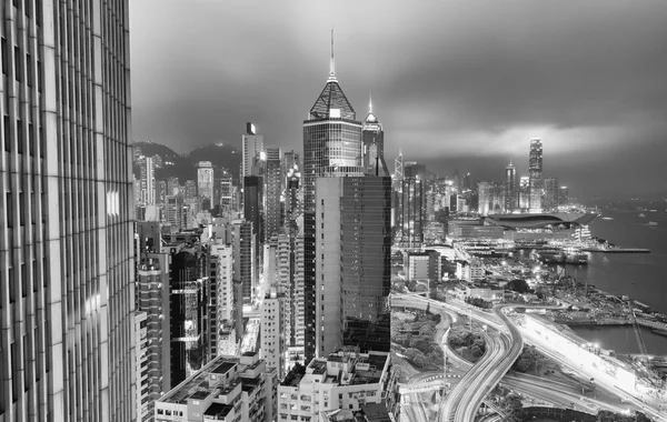 Black and white modern buildings of Hong Kong at night