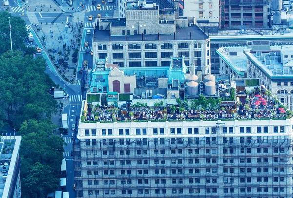 Enjoying life on a skyscraper rooftop, New York City