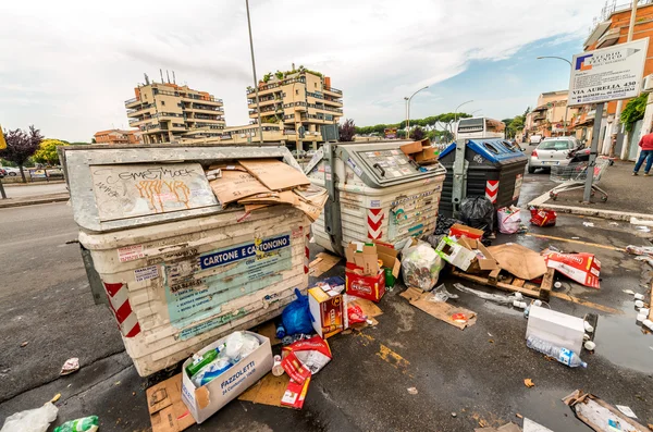 ROME - MAY 20, 2014: Dirty garbage cans in city outskirts. Rome
